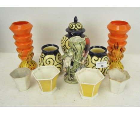 A collection of pottery vases, a frog candlestick, a pair of orange opaque and marbled candlesticks and other items (8)