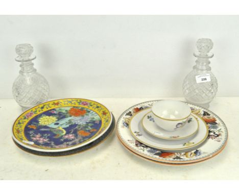 Two cut glass decanters, of squat form, 21cm high, together with a selection of ceramic plates, including Wedgwood "Bullfinch