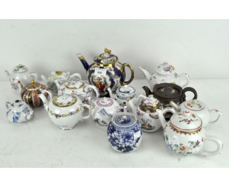 A collection of teapots, most from the Victoria &amp; Albert musuem