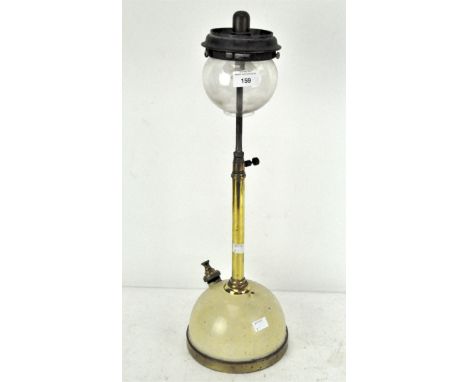 A vintage brass and painted tilly table lamp, with glass shade, 55cm high