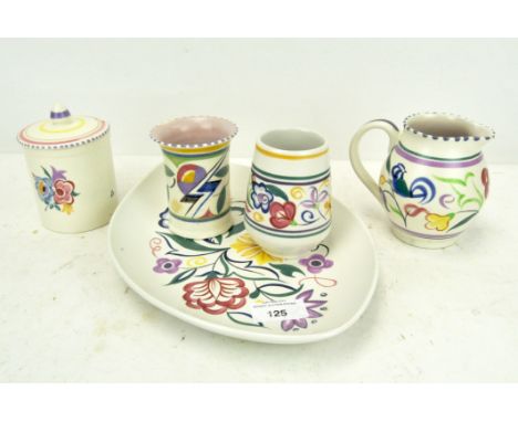 Five pieces of Poole pottery, to include milk jug, two vases and more