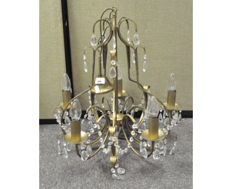 A five branch gilt metal chandelier, with glass drops, approximately 52cm high