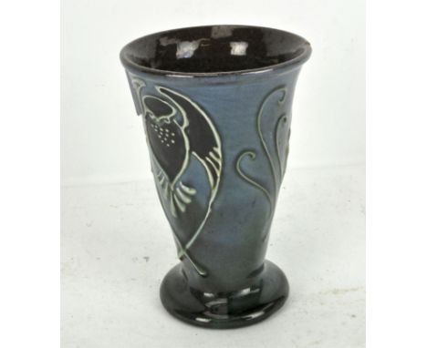 A Brannam Barum, Devon vase or beaker, made for Liberty &amp; Co, with tube lined decoration, 11cm high