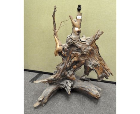 An ornamental natural wood formation formed into a lamp, 92cm high