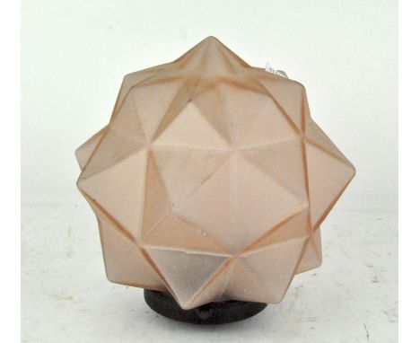 An Art Deco opaque rose tinted glass star shaped lamp shade, with fixture, 19cm high