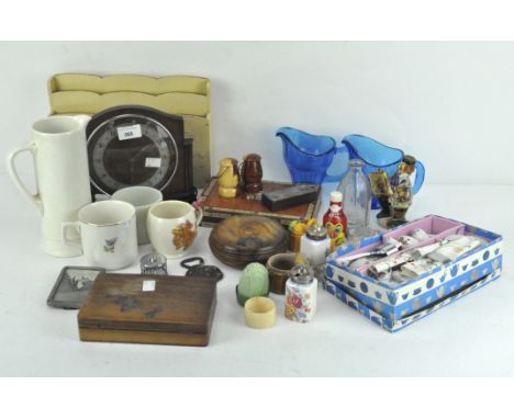A mixed group of items, including a mid-century clock by Elco, cigar box and wooden boxes and more