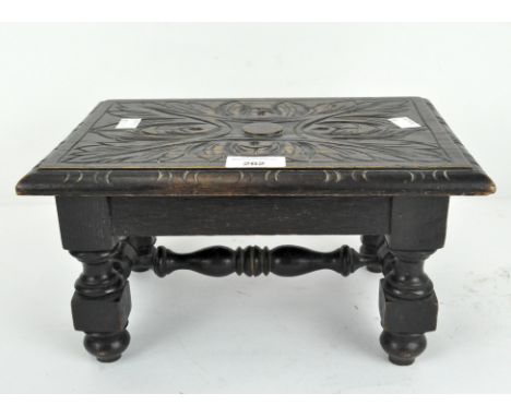 A 19th century oak stool, carved decoration throughout, 15cm x 30cm x 21cm
