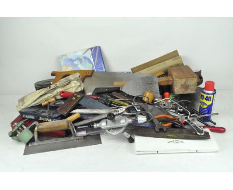 A collection of tools and art equipment