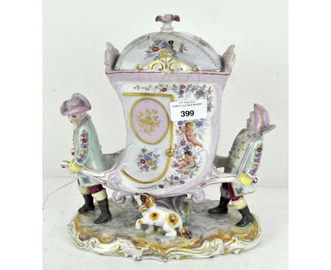 A large ceramic biscuit container in the form of a Bath chair, adorned with gilt and foliate decoration throughout, 26cm high