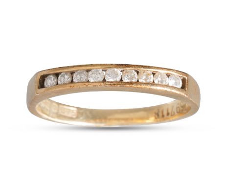 A DIAMOND HALF ETERNITY RING, channel set with brilliant cut diamonds. Estimated: weight of diamonds: 0.22 ct. Size: K