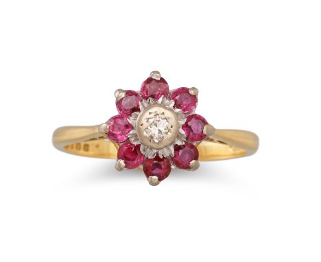 A RUBY AND DIAMOND RING, mounted in 18ct gold, size K - L