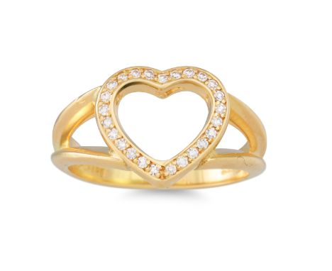 A CHOPARD DIAMOND SET RING, heart shaped in 18ct yellow gold, stamped Chopard. Estimated: weight of diamonds: 0.13 ct. colour