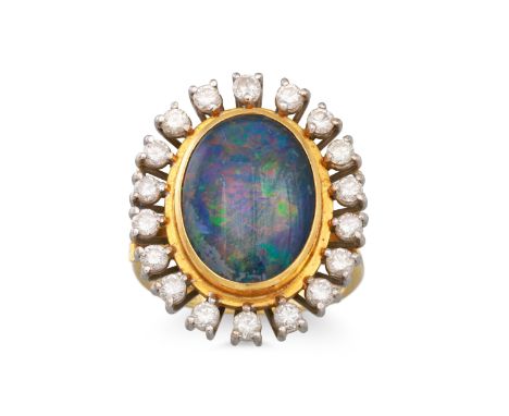 A DRESS RING, set with an opal doublet with a diamond surround, mounted in 18ct yellow gold, size P, gross weight 11.4 g.