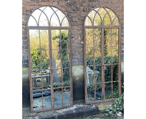 ARCHITECTURAL GARDEN MIRRORS, a pair, gated design, 180cm x 75cm. (2) 