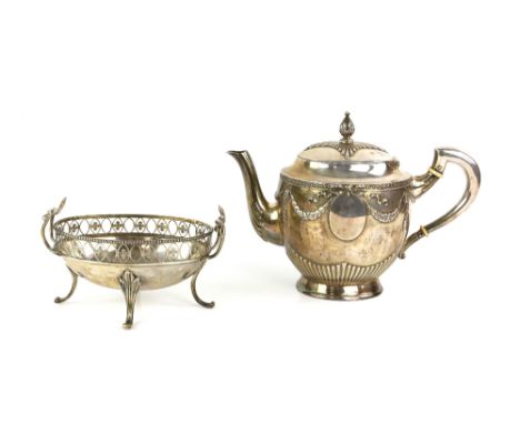 German silver teapot, decorated with ribbon and swag border and vacant cartouche, stamped 800, the handle with ivory insulato