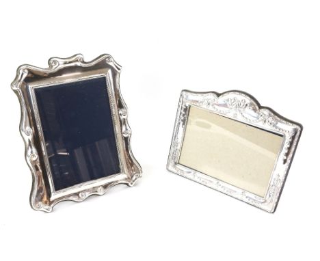 Two modern silver-mounted photograph frames including a landscape frame decorated in swags and bows, by Carrs, Sheffield 1994