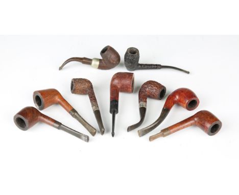 A collection of seventeen smoking pipes, including Kaywoodie Air-Way, Bewlan, Carey Magic Inch, Donegal Rocky, Imperial Old B