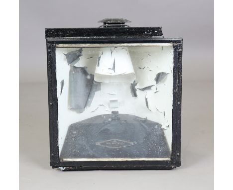 An Adlake No. 33 black painted railway lantern of triangular form, height 48cm, width 44cm.Buyer’s Premium 29.4% (including V