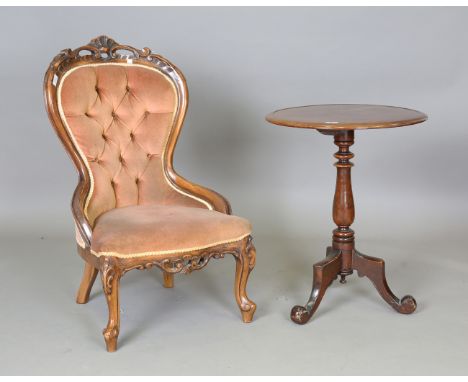 A Victorian walnut showframe salon chair, upholstered in peach fabric with shaped button back, height 92cm, width 54cm, and a