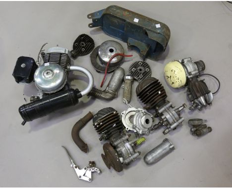 A Mobylette AV29 type engine, three further vintage engines, leads and related parts.Buyer’s Premium 29.4% (including VAT @ 2
