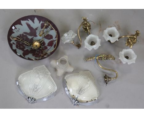A pair of Art Deco chrome and glass wall lights, each shade relief moulded with a nude lady, height 24cm, width 28cm, togethe
