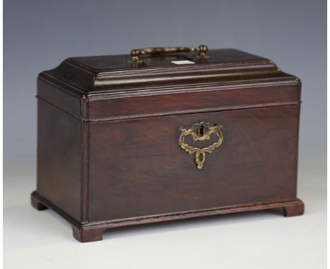 A George III mahogany tea caddy with brass handle and escutcheon, the hinged lid opening to reveal a compartmentalized interi