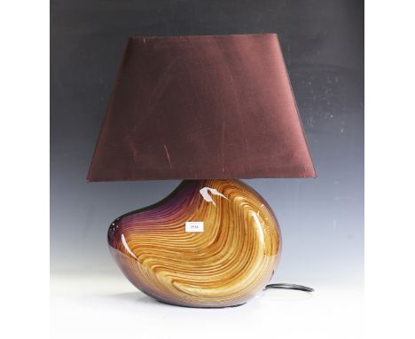 A modern lacquered and carved ply table lamp by Christian Wallis, bearing signature, height to top of light fitting 30cm.Buye