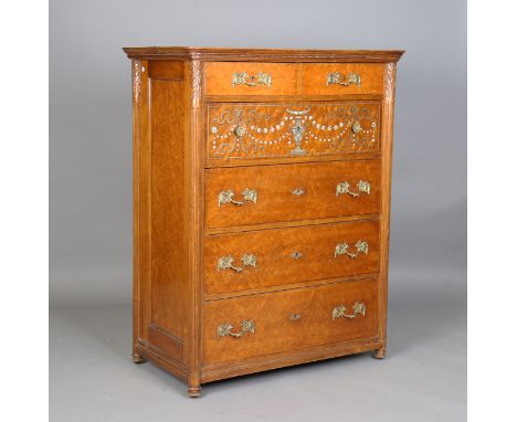 An early 20th century bird's eye maple chest, inlaid with urns and bellflower swags in mother-of-pearl, the two short and thr
