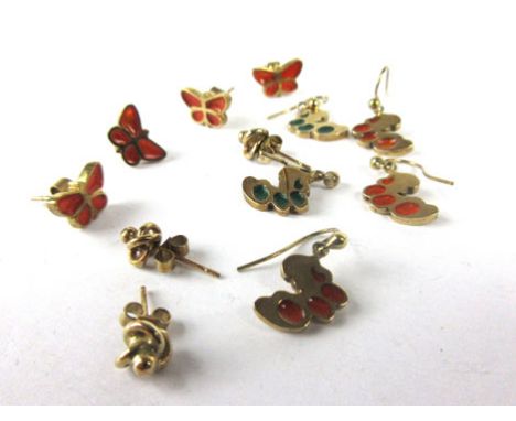 Five pairs of 9ct yellow gold earrings, including two enamel decorated pairs in the form of butterfly's, together with two fu