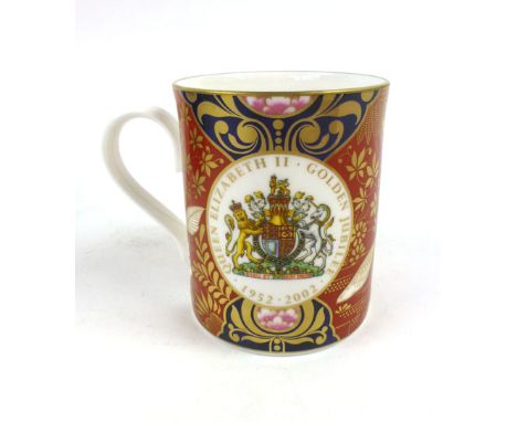A cased Royal Worcester figure modelled as a wren, h. 8.5 cm, together with a cased commemorative cup