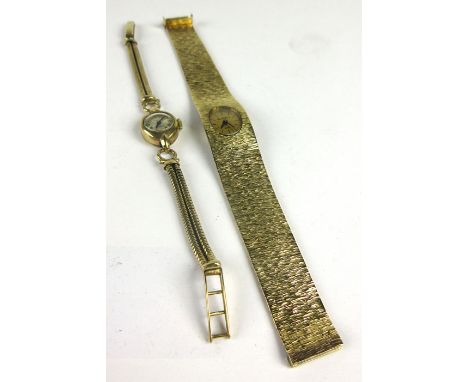 A 9ct yellow gold ladies wristwatch by Bueche Girod, the oval face with black baton numerals on an articulated bark design st