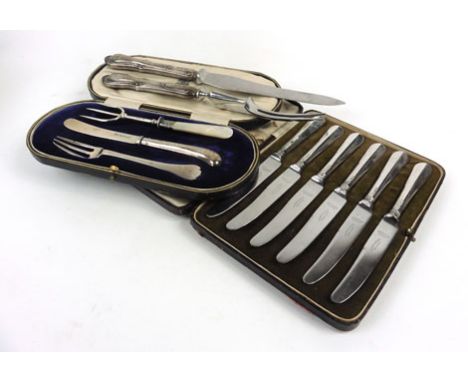 A cased set of six silver handled butter knives, Sheffield hallmarks, together with a silver handled carving set, a part chri