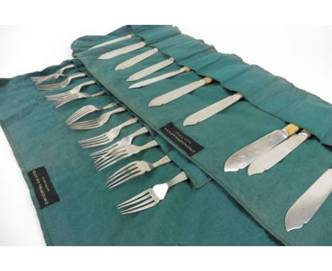 A twelve sitting set of silver handled flatware with ivorine handles, Sheffield 1938