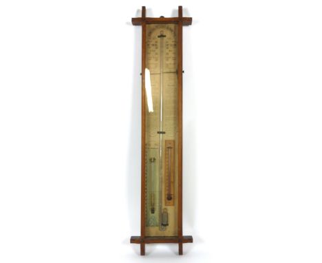 An early 20th century Admiral Fitzroy's oak cased barometer, with Atmospheric gauge and Godfrey Kettering thermometer. h. 105