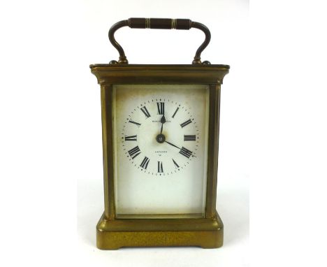 A French brass cased five glass carriage clock the enamelled face with Roman numerals signed 'Whiteleys London'. h. 14 cm, w.