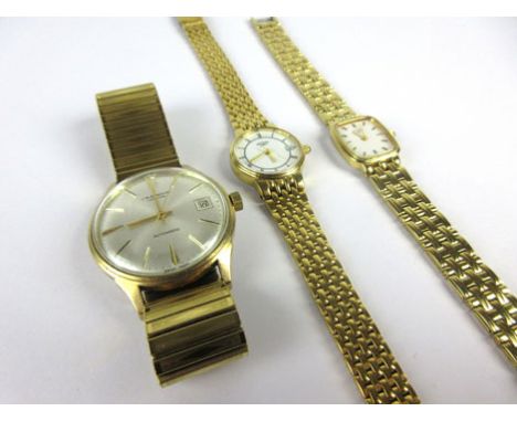A gold plated gentleman's automatic wristwatch by Benson, the circular silvered dial with gold coloured baton numerals and da