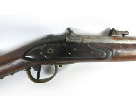 A late 19th century English percussion rifle missing hammer, with leaver rearsight, brass fittings, plain grip and stock, pro