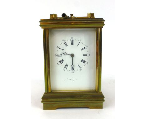 A brass cased five glass carriage clock/repeater striking on a gong, the enamelled face with Roman numerals and pierced hands
