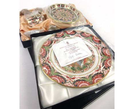 A cased Royal Crown Derby miniature collectors teaset, together with a cased 1998 Chirstmas plate by Hugh Gibson, 1317/1750