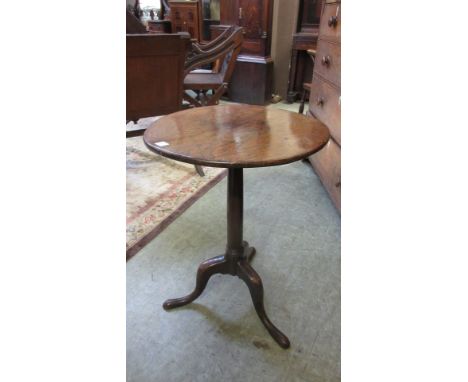 An 18th century oak and elm tripod table, the circular elm top on turned oak column. h. 69 cm, dia. 49 cm   CONDITION REPORT: