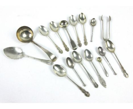 A mixed group of silver coffee spoons, a sauce ladle, a pair of sugar nips and other items, various dates and makers (qty)