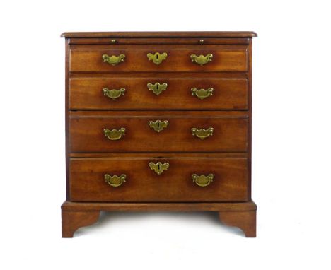 A George II mahogany bachelors chest of drawers, the moulded top over brushing slide above four graduated drawers with origin