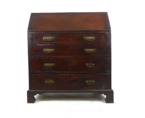 A George III mahogany bureau the fall front revealing a fitted interior over four graduated drawers on shaped bracket feet. h
