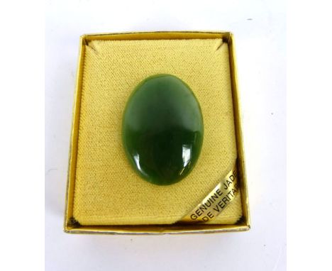 A cased 20th century jade brooch of oval form with a gilt metal clasp   CONDITION REPORT:  Size-3x2x0.5cm approx.Dark green o