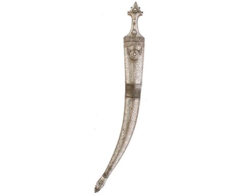 A LATE 19TH OR EARLY 20TH CENTURY LARGE WAHABITE JAMBIYA, 51.5cm curved blade with raised medial ridge, chiselled with a geom