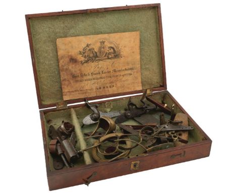 A LARGE QUANTITY OF LOCK PLATES AND GUN FURNITURE, to include an 1855 Tower percussion lock, various flintlock locks, Snider 