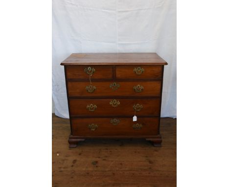 A Georgian fruitwood chest of two short and three long drawers, on ogee bracket feet.  37½ins wide.  Est £100-150