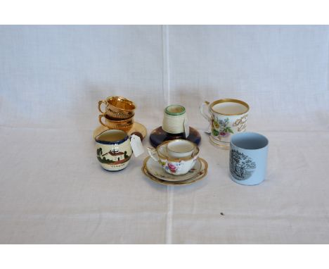 A pair of Wedgwood match strikers with marble effect bases, two gilt teacups and saucers, a Dresden style coffee cup and sauc