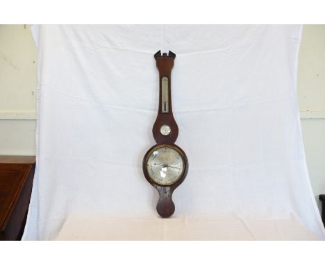 A 19th century mahogany cased barometer/thermometer/hygrometer with broken pediment and silvered back plates.  The barometer 