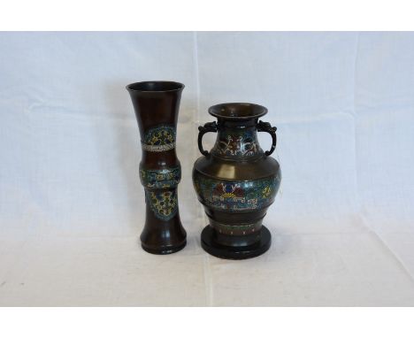 A cloisonné enamel decorated twin handled vase and another with bulbous central section, on an out-splayed foot.  14¾ins.  Es